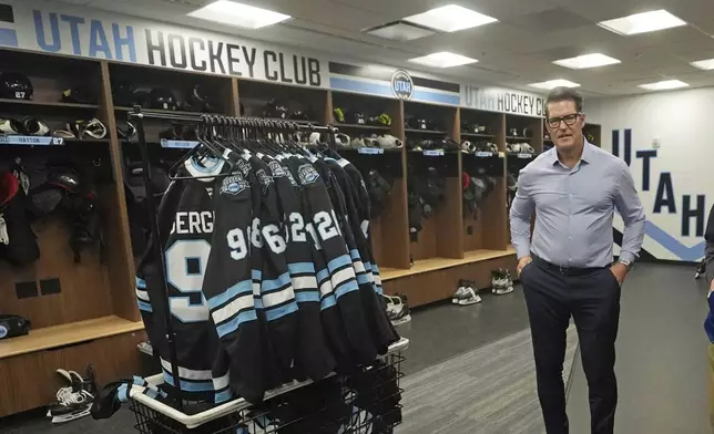 Utah Hockey Club general manager Bill Armstrong speaks during a tour of the new temporary practice facility locker room at the Olympic Oval Tuesday, Sept. 17, 2024, in Kearns, Utah. (AP Photo/Rick Bowmer)