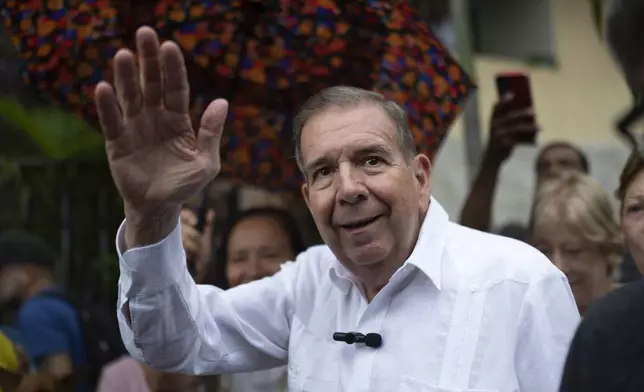 FILE - Venezuelan opposition presidential candidate Edmundo Gonzalez waves to supporters during a political event at a square in the Hatillo municipality of Caracas, Venezuela, June 19, 2024. (AP Photo/Ariana Cubillos, File)