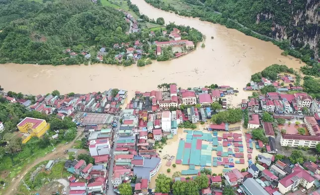 Flood triggered by Typhoon Yagi submerges houses in Lang Son province, Vietnam Monday, Sept. 9, 2024. (Nguyen Anh Tuan/VNA via AP)