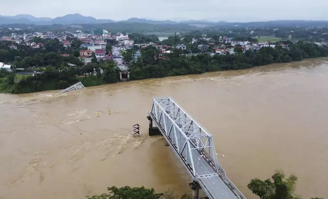 A bridge collapse due to floods triggered by typhoon Yagi in Phu Tho province, Vietnam on Monday, Sept. 9, 2024 (Bui Van Lanh/ VNA via AP)