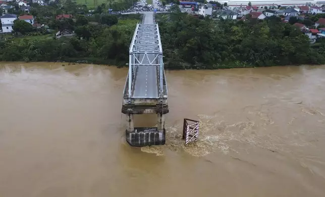 A bridge collapse due to floods triggered by typhoon Yagi in Phu Tho province, Vietnam on Monday, Sept. 9, 2024 (Bui Van Lanh/ VNA via AP)