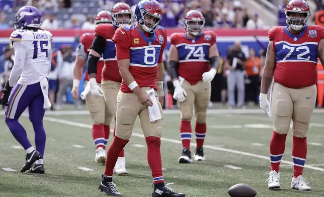 New York Giants quarterback Daniel Jones (8) walks off the field during the second half of an NFL football game against the Minnesota Vikings, Sunday, Sept. 8, 2024, in East Rutherford, N.J. (AP Photo/Adam Hunger)