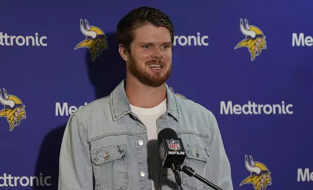 Minnesota Vikings quarterback Sam Darnold answers questions during a press conference after an NFL football game against the New York Giants, Sunday, Sept. 8, 2024, in East Rutherford, N.J. (AP Photo/Pamela Smith)