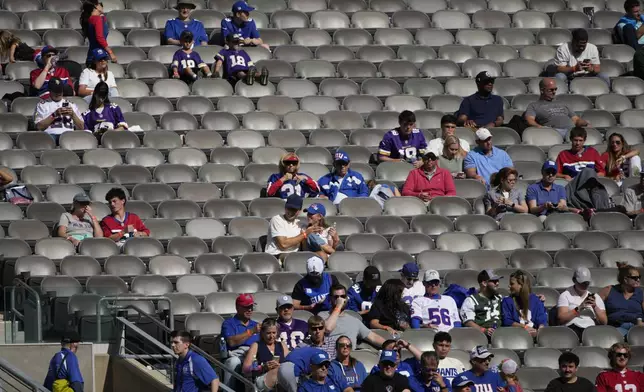 Fans attend an NFL football game between the Minnesota Vikings and New York Giants, Sunday, Sept. 8, 2024, in East Rutherford, N.J. (AP Photo/Pamela Smith)