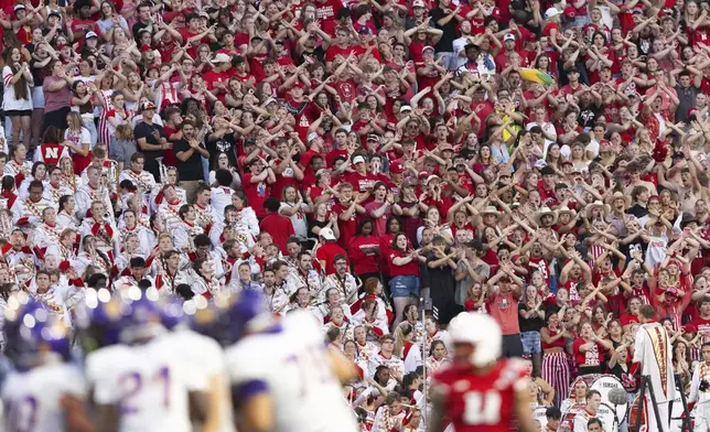 Nebraska fans cheer for the defense as they play against Northern Iowa during the first half of an NCAA college football game Saturday, Sept. 14, 2024, in Lincoln, Neb. (AP Photo/Rebecca S. Gratz)