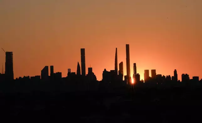 The New York skyline is seen during a fourth round match of the U.S. Open tennis championships, Monday, Sept. 2, 2024, in New York. (AP Photo/Eduardo Munoz Alvarez)