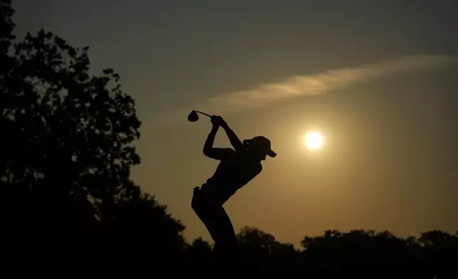 Europe's Carlota Ciganda hits from the third tee during a Solheim Cup golf tournament foursome match at Robert Trent Jones Golf Club, Saturday, Sept. 14, 2024, in Gainesville, Va. (AP Photo/Matt York)