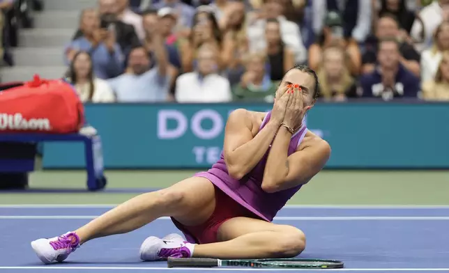 Aryna Sabalenka, of Belarus, reacts after defeating Jessica Pegula, of the United States, to win the women's singles final of the U.S. Open tennis championships, Saturday, Sept. 7, 2024, in New York. (AP Photo/Julia Nikhinson)