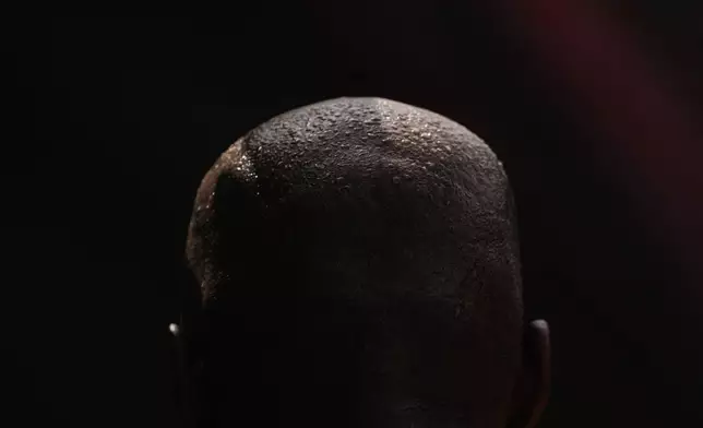 Houston Astros' Jason Heyward walks through the dugout during the sixth inning of a baseball game against the Los Angeles Angels in Anaheim, Calif., Sunday, Sept. 15, 2024. (AP Photo/Ashley Landis)