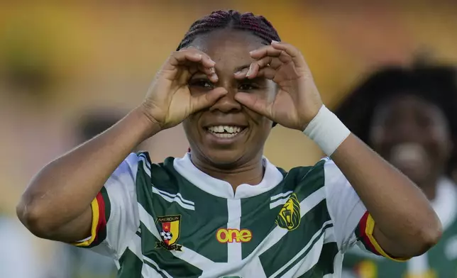 Cameroon's Achta Toko celebrates scoring her side's opening goal against Australia during a U-20 Women's World Cup soccer match in Bogota, Colombia, Friday, Sept. 6, 2024. (AP Photo/Fernando Vergara)