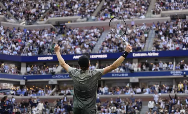 Jannik Sinner, of Italy, reacts after defeating Taylor Fritz, of the United States, to win the men's singles final of the U.S. Open tennis championships, Sunday, Sept. 8, 2024, in New York. (AP Photo/Julia Nikhinson)