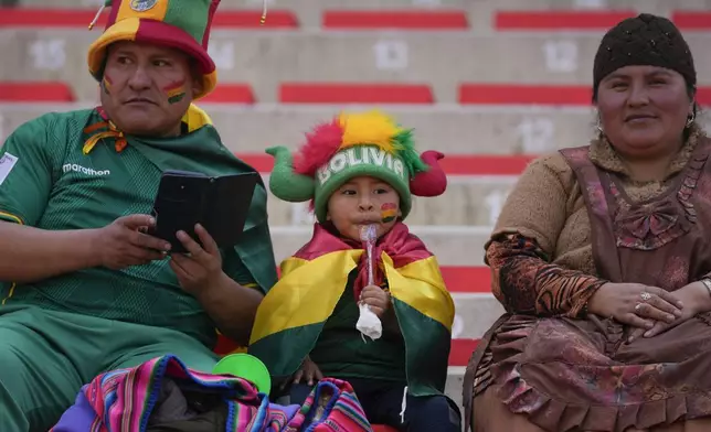 Bolivia fans wait for the start of a FIFA World Cup 2026 qualifying soccer match against Venezuela at the Municipal de Villa Ingenio stadium in El Alto, Bolivia, Thursday, Sept. 5, 2024. (AP Photo/Juan Karita)