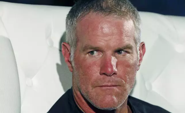 FILE - Retired NFL quarterback Brett Favre participates in a question and answer session at a fundraiser for Willowood Developmental Center, a facility that provides training and assistance for special needs students, Wednesday, Oct. 17, 2018 in Jackson, Miss. (AP Photo/Rogelio V. Solis, File)