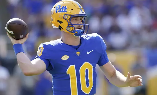 Pittsburgh quarterback Eli Holstein (10) looks to throw during the first half of an NCAA college football game against West Virginia, Saturday, Sept. 14, 2024, in Pittsburgh. (AP Photo/Matt Freed)