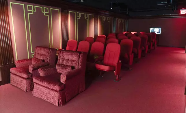 The replica of the White House movie theater room, shown at The People's House exhibit, Monday, Sept. 16, 2024 in Washington. (AP Photo/Jose Luis Magana)