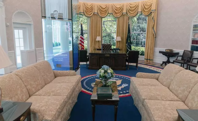 A replica of the Oval Office as is today, shown at The People's House exhibit, Monday, Sept. 16, 2024 in Washington. (AP Photo/Jose Luis Magana)