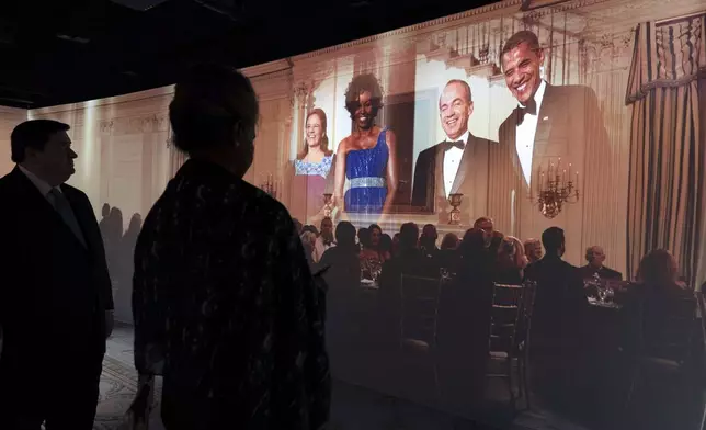 A 3D interactive room with dinner tables, music and videos of State Dinners at the White House, shown at The People's House exhibit, Monday, Sept. 16, 2024 in Washington. (AP Photo/Jose Luis Magana)