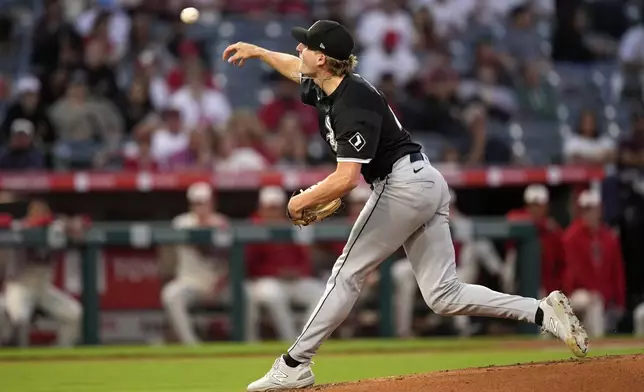 Chicago White Sox starting pitcher Jonathan Cannon throws to the plate during the first inning of a baseball game against the Los Angeles Angels, Monday, Sept. 16, 2024, in Anaheim, Calif. (AP Photo/Mark J. Terrill)