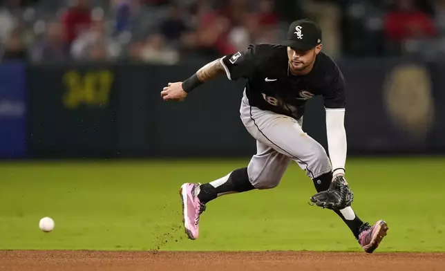 Chicago White Sox second baseman Jacob Amaya fields a ball hit by Los Angeles Angels' Jordyn Adams during the fifth inning of a baseball game, Monday, Sept. 16, 2024, in Anaheim, Calif. Adams was thrown out at first on the play. (AP Photo/Mark J. Terrill)