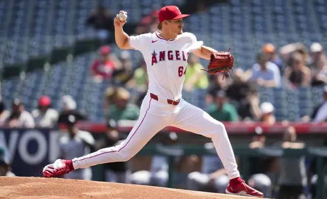 Los Angeles Angels starting pitcher Jack Kochanowicz throws during the first inning of a baseball game against the Chicago White Sox in Anaheim, Calif., Wednesday, Sept. 18, 2024. (AP Photo/Ashley Landis)