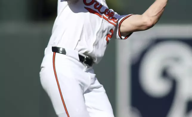 Baltimore Orioles shortstop Gunnar Henderson makes a catch for an out during the third inning of a baseball game against the Chicago White Sox, Monday, Sept. 2, 2024, in Baltimore. (AP Photo/Daniel Kucin Jr.)