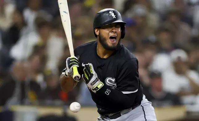 Chicago White Sox's Lenyn Sosa reacts after being hit by a pitch from San Diego Padres relief pitcher Jason Adam during the eighth inning of a baseball game, Saturday, Sept. 21, 2024, in San Diego. (AP Photo/Ryan Sun)