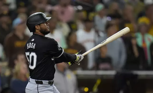 Chicago White Sox's Lenyn Sosa watches his two-run home run during the ninth inning of a baseball game against the San Diego Padres, Friday, Sept. 20, 2024, in San Diego. (AP Photo/Gregory Bull)