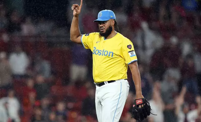 Boston Red Sox closer Kenley Jansen reacts to the fly out by Chicago White Sox's Andrew Benintendi to end the baseball game in the ninth inning, Saturday, Sept. 7, 2024, in Boston. (AP Photo/Michael Dwyer)