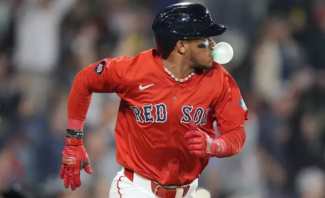 Boston Red Sox's Ceddanne Rafaela runs on his two-run home run during the seventh inning of a baseball game against the Chicago White Sox, Friday, Sept. 6, 2024, in Boston. (AP Photo/Michael Dwyer)