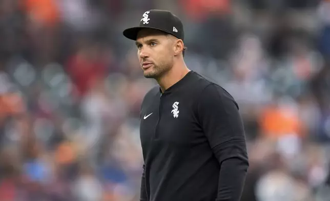 Chicago White Sox interim manger Grady Sizemore watches against the Detroit Tigers in the eighth inning of a baseball game, Sunday, Sept. 29, 2024, in Detroit. (AP Photo/Paul Sancya)