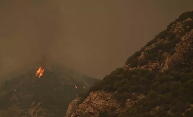 The Line Fire burns in the mountains Monday, Sept. 9, 2024, near Forest Falls, Calif. (AP Photo/Eric Thayer)