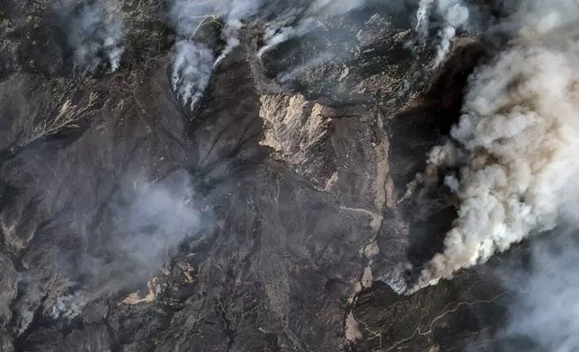 This image released by Maxar Technologies shows fires in Running Springs, Calif., on Wednesday, Sept. 11, 2024. (Satellite image ©2024 Maxar Technologies via AP)