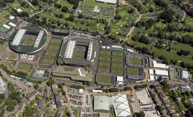 FILE - An aerial view of All England Tennis Club on day seven of the Wimbledon Tennis Championships in London, July 8, 2019. (Thomas Lovelock/AELTC via AP, Pool, File)