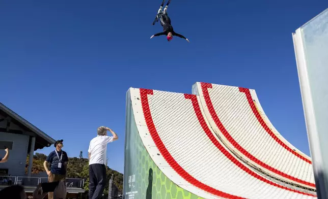 International Olympic Committee President Thomas Bach, bottom center, watches an athlete practice as he checks out the facilities at the Spence Eccles Olympic Freestyle Pool within Utah Olympic Park in Park City, Utah, Saturday, Sept. 28. 2024. (Isaac Hale/The Deseret News via AP)