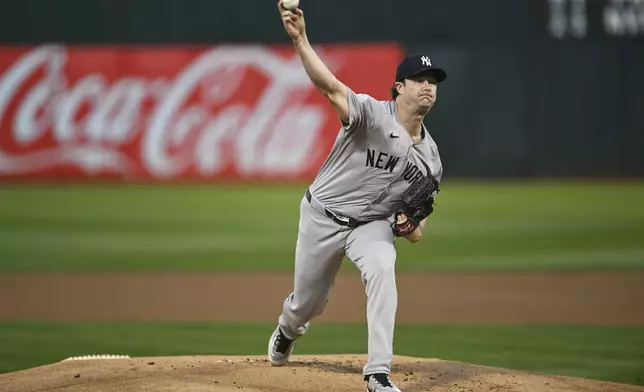 New York Yankees pitcher Gerrit Cole throws against the Oakland Athletics during the first inning of a baseball game Friday, Sept. 20, 2024, in Oakland, Calif. (AP Photo/Eakin Howard)