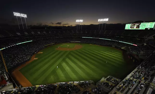 The Oakland Athletics play the New York Yankees during the fourth inning of a baseball game Friday, Sept. 20, 2024, in Oakland, Calif. (AP Photo/Eakin Howard)