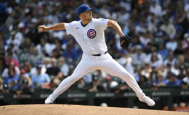 Chicago Cubs starter Jameson Taillon delivers a pitch during the first inning of a baseball game against the New York Yankees in Chicago, Sunday, Sept. 8, 2024. (AP Photo/Paul Beaty)