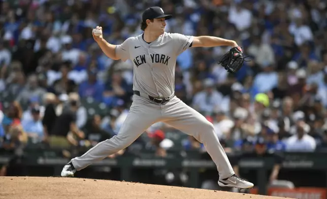 New York Yankees starter Gerrit Cole delivers a pitch during the first inning of a baseball game against the Chicago Cubs in Chicago, Sunday, Sept. 8, 2024. (AP Photo/Paul Beaty)