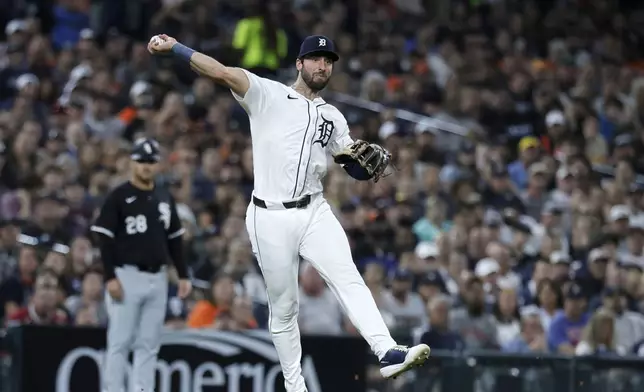 Detroit Tigers third baseman Matt Vierling throws out Chicago White Sox's Lenyn Sosa at first base in the seventh inning of a baseball game, Friday, Sept. 27, 2024, in Detroit. (AP Photo/Duane Burleson)