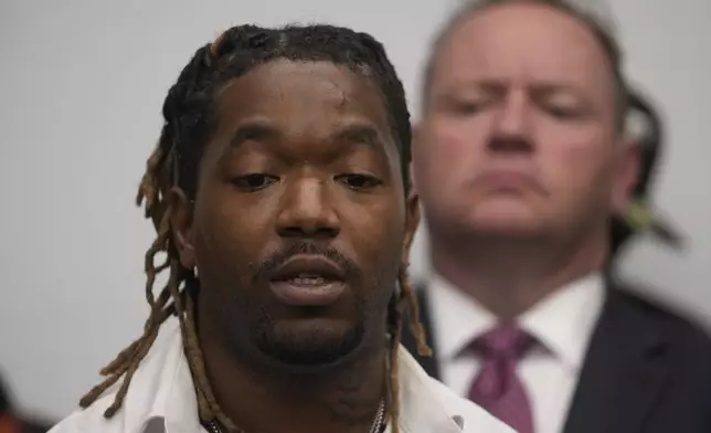 Michael Moss, 37, a victim, speaks during a press conference regarding a lawsuit alleging that more than 200 men and women were sexually abused as children while in custody at juvenile detention centers in Illinois, Tuesday, Sept. 24, 2024, in Chicago. (AP Photo/Erin Hooley)