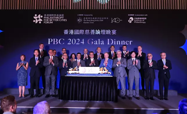 HKSAR Government Financial Secretary Paul Chan (front row, centre), Club Chairman Michael Lee (front row, 5th left), Club Deputy Chairman Martin Liao (front row, 4th left), Club Stewards, Club CEO Winfried Engelbrecht-Bresges (front row,5th right) celebrated the 140th Anniversary of the establishment of The Hong Kong Jockey Club at the Gala Dinner.