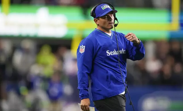 Seattle Seahawks head coach Mike Macdonald reacts during the second half of an NFL football game against the San Francisco 49ers, Thursday, Oct. 10, 2024 in Seattle. (AP Photo/Lindsey Wasson)