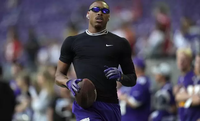 Minnesota Vikings wide receiver Justin Jefferson warms up before an NFL football game against the San Francisco 49ers, Sunday, Sept. 15, 2024, in Minneapolis. (AP Photo/Abbie Parr)