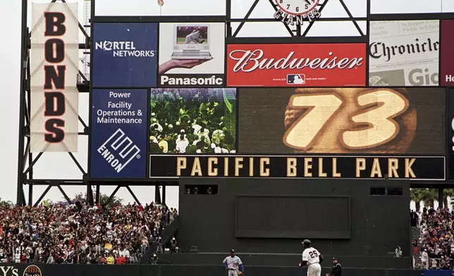 FILE - San Francisco Giants' Barry Bonds (25) circles the bases after he hit his 73rd home run of the season in a baseball game against the Los Angeles Dodgers, Sunday, Oct. 7, 2001, at Pacific Bell Park in San Francisco. (AP Photo/Eric Risberg, File)