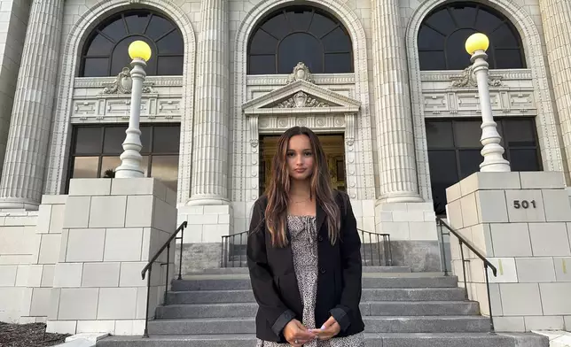 Kaylin Hayman, 17, poses outside Ventura City Hall in Ventura, Calif., Oct. 17, 2024. (AP Photo/Eugene Garcia)