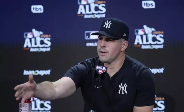 New York Yankees pitcher Carlos Rodón speaks during a news conference ahead of an American League Championship series baseball game against the Cleveland Guardians, Sunday, Oct. 13, 2024, in New York. (AP Photo/Frank Franklin II)