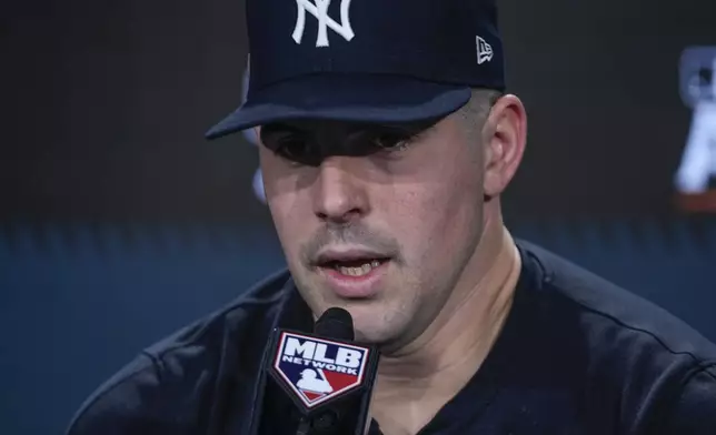 New York Yankees pitcher Carlos Rodón speaks during a news conference ahead of an American League Championship series baseball game against the Cleveland Guardians, Sunday, Oct. 13, 2024, in New York. (AP Photo/Frank Franklin II)