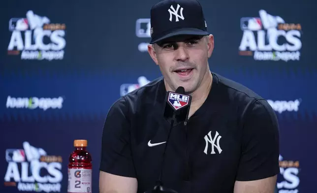 New York Yankees pitcher Carlos Rodón speaks during a news conference ahead of an American League Championship series baseball game against the Cleveland Guardians, Sunday, Oct. 13, 2024, in New York. (AP Photo/Frank Franklin II)