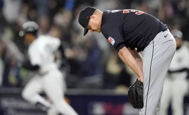 Cleveland Guardians starting pitcher Alex Cobb reacts after giving up a home run to New York Yankees' Juan Soto during the third inning in Game 1 of the baseball AL Championship Series Monday, Oct. 14, 2024, in New York. (AP Photo/Frank Franklin II)