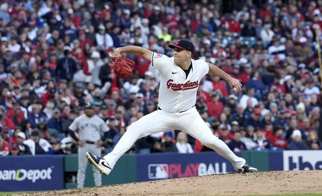 Cleveland Guardians starting pitcher Matthew Boyd throws against the New York Yankees during the fourth inning in Game 3 of the baseball AL Championship Series Thursday, Oct. 17, 2024, in Cleveland.(AP Photo/Godofredo Vásquez )